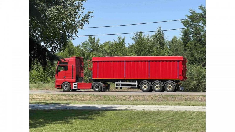 Напівпричеп контейнеровоз з пристроєм для самовивантаження б/в